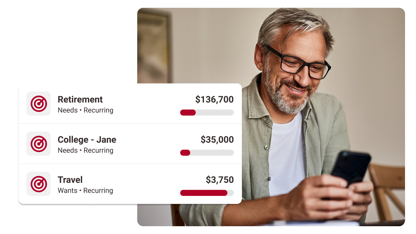 Smiling man accessing his savings accounts on his phone