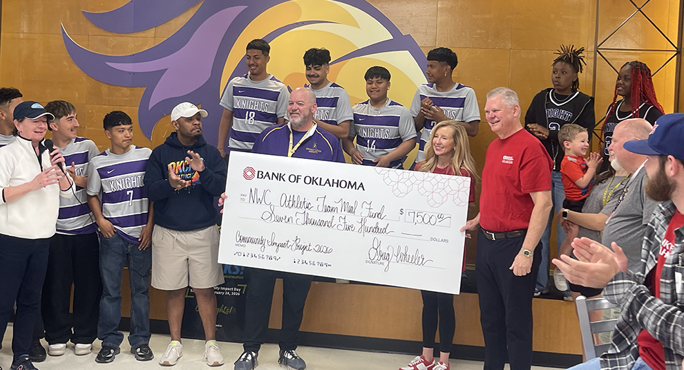 Bank of Oklahoma present a $7,500 check to Northwest Classen High School students.