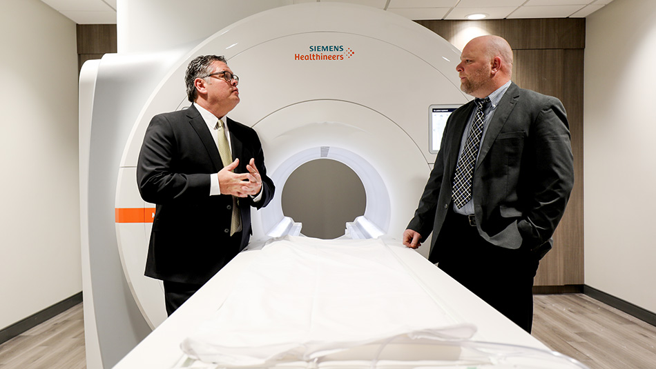 Rocky Vig, co-founder and Midtown Medical managing partner (pictured left), and Kris Watson, BOK Financial commercial banker (pictured right).