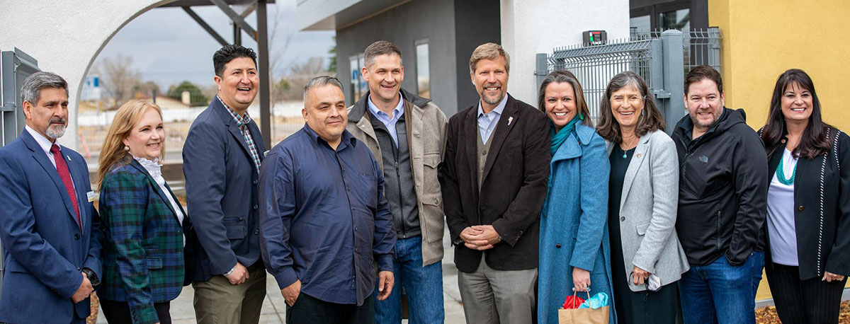 Ribbon cutting for an affordable housing project in New Mexico.