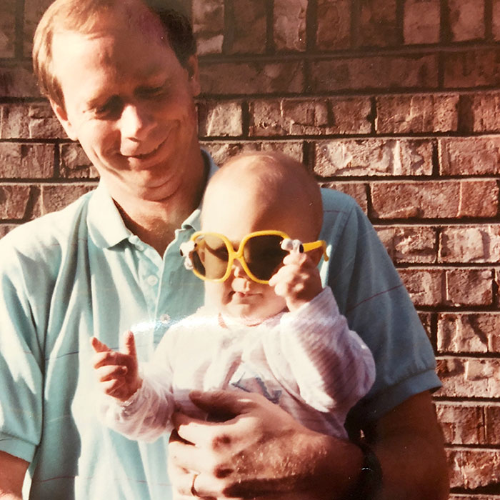 Margy Lam, as an infant, with her father.