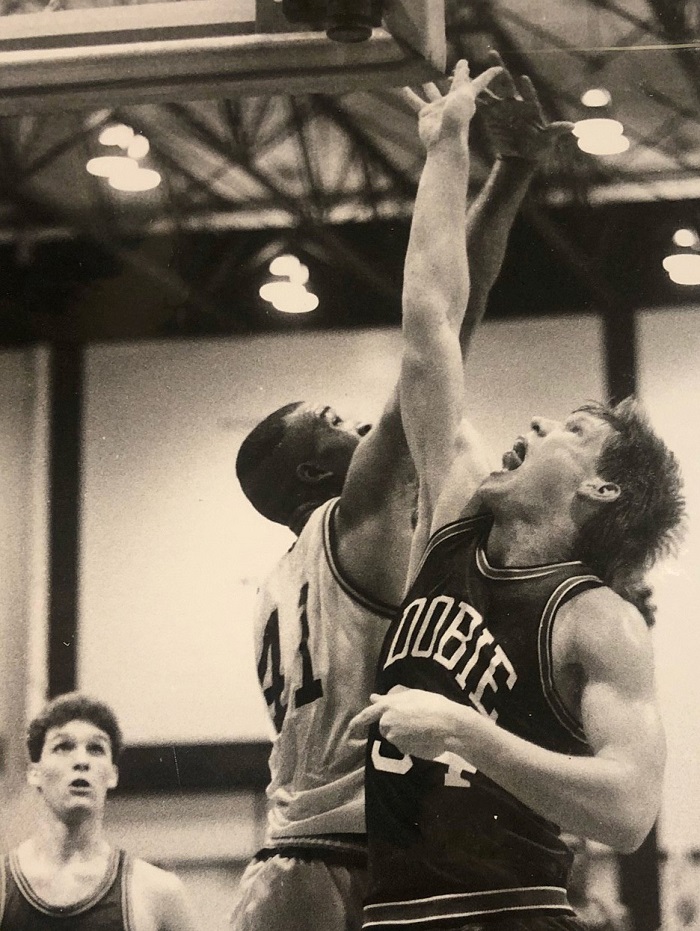 Stacy Kymes playing basketball when he was younger