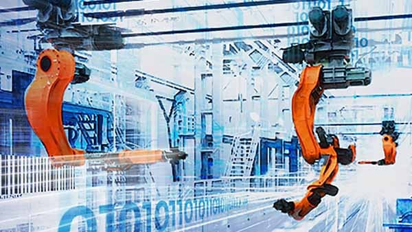 Robotic arms in a manufacturing facility.