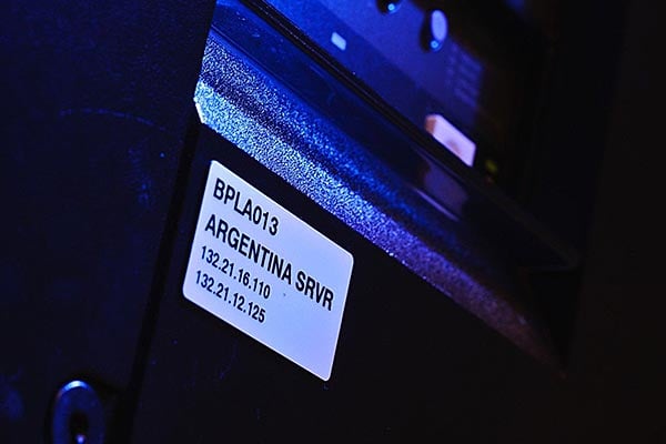 A labeled server rack panel in a cooled data center environment.