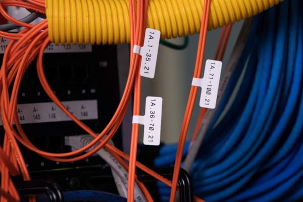 Flag labels identify orange data center cables.