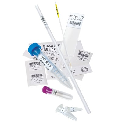 Barcoded lab labels shown on a vial, slide, Eppendorf tube, pipette and in the background.