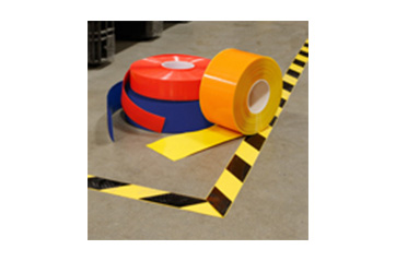 Several colors and patterns of Brady floor marking tape.