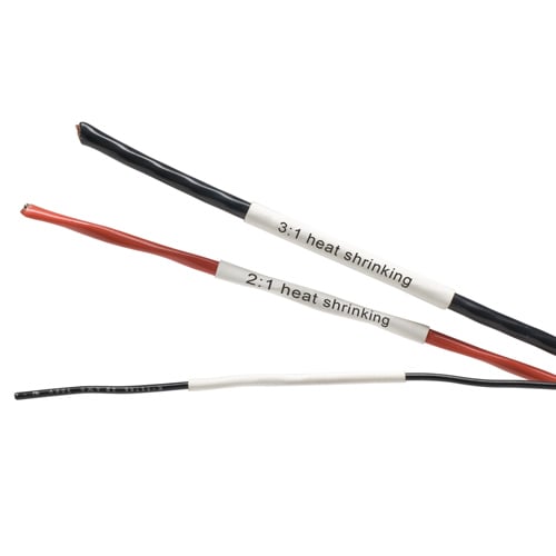 A red and two black wires each labeled with a heat shrink sleeve label. 