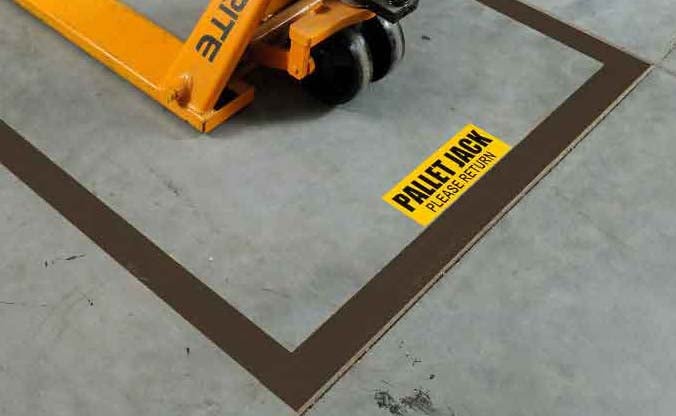 Brown toughstripe tape on floor.