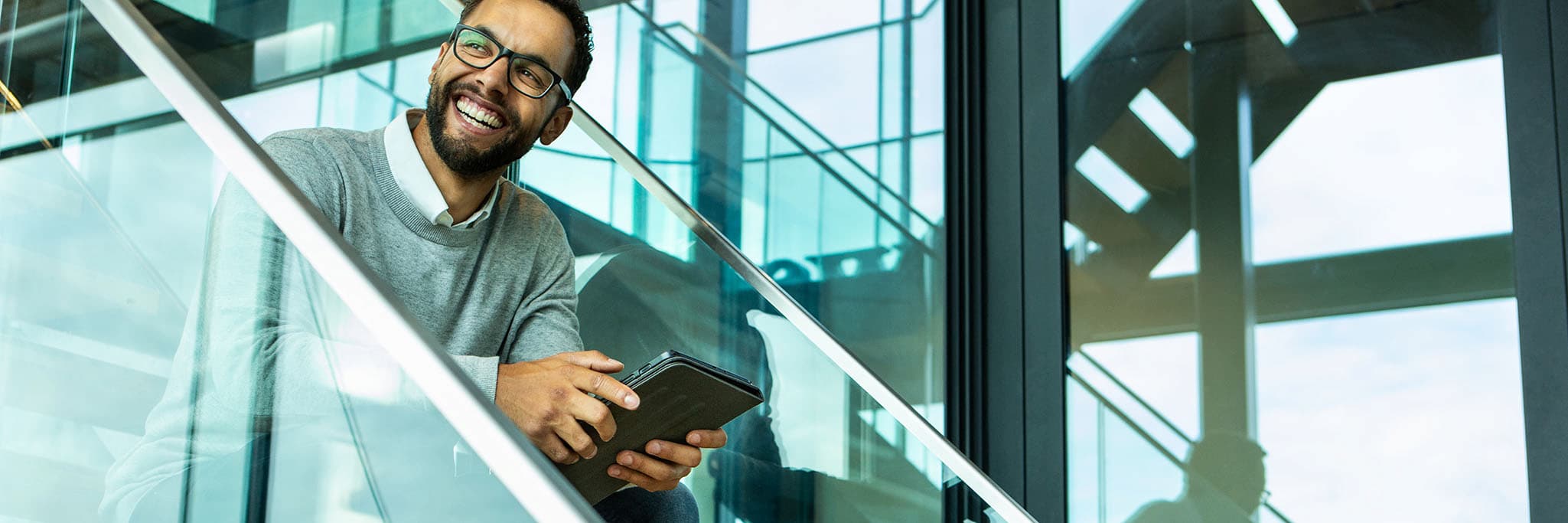 Employee Man laughing on stairs