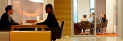 People having meetings in office