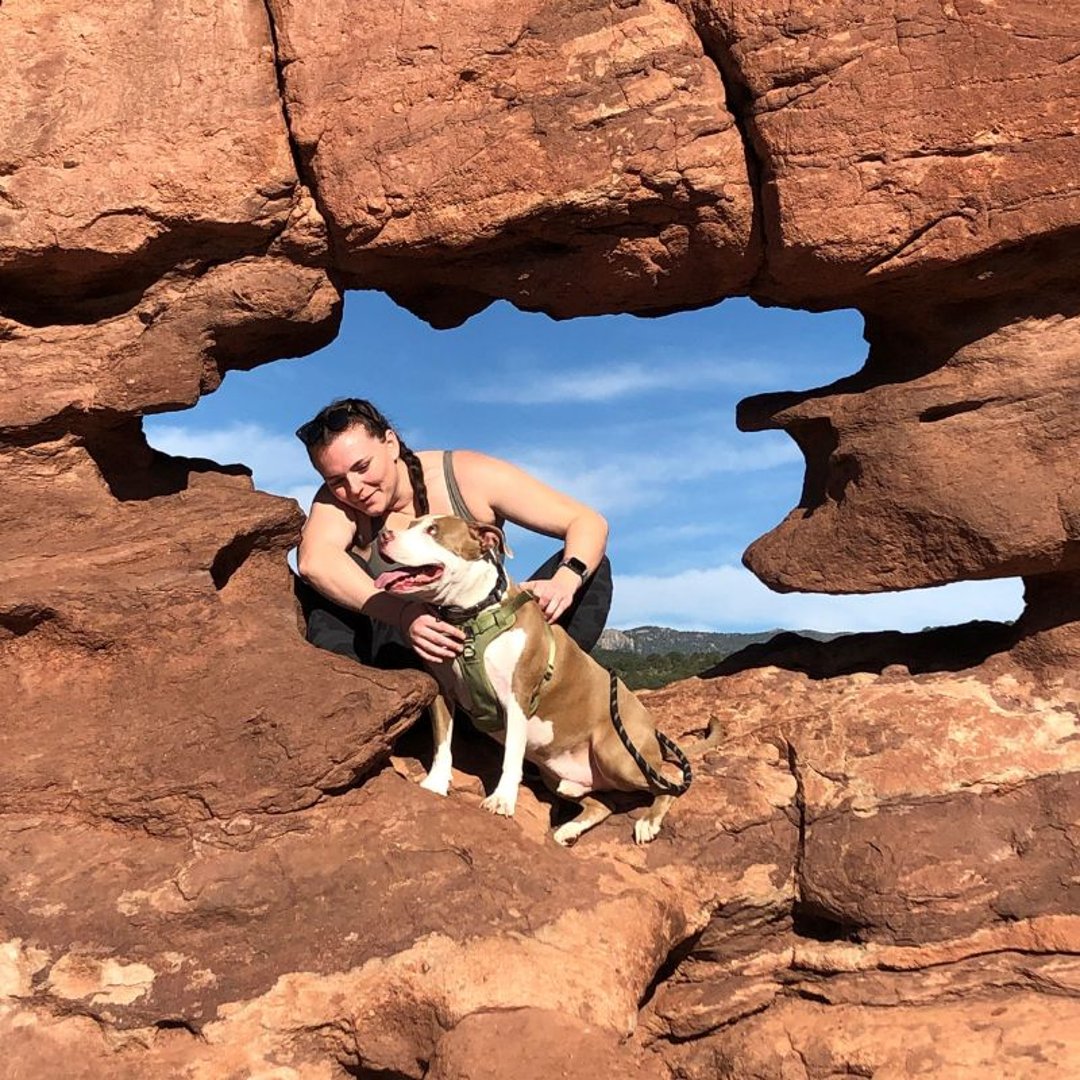 Katie Rossman on a hike with her dog Lenny