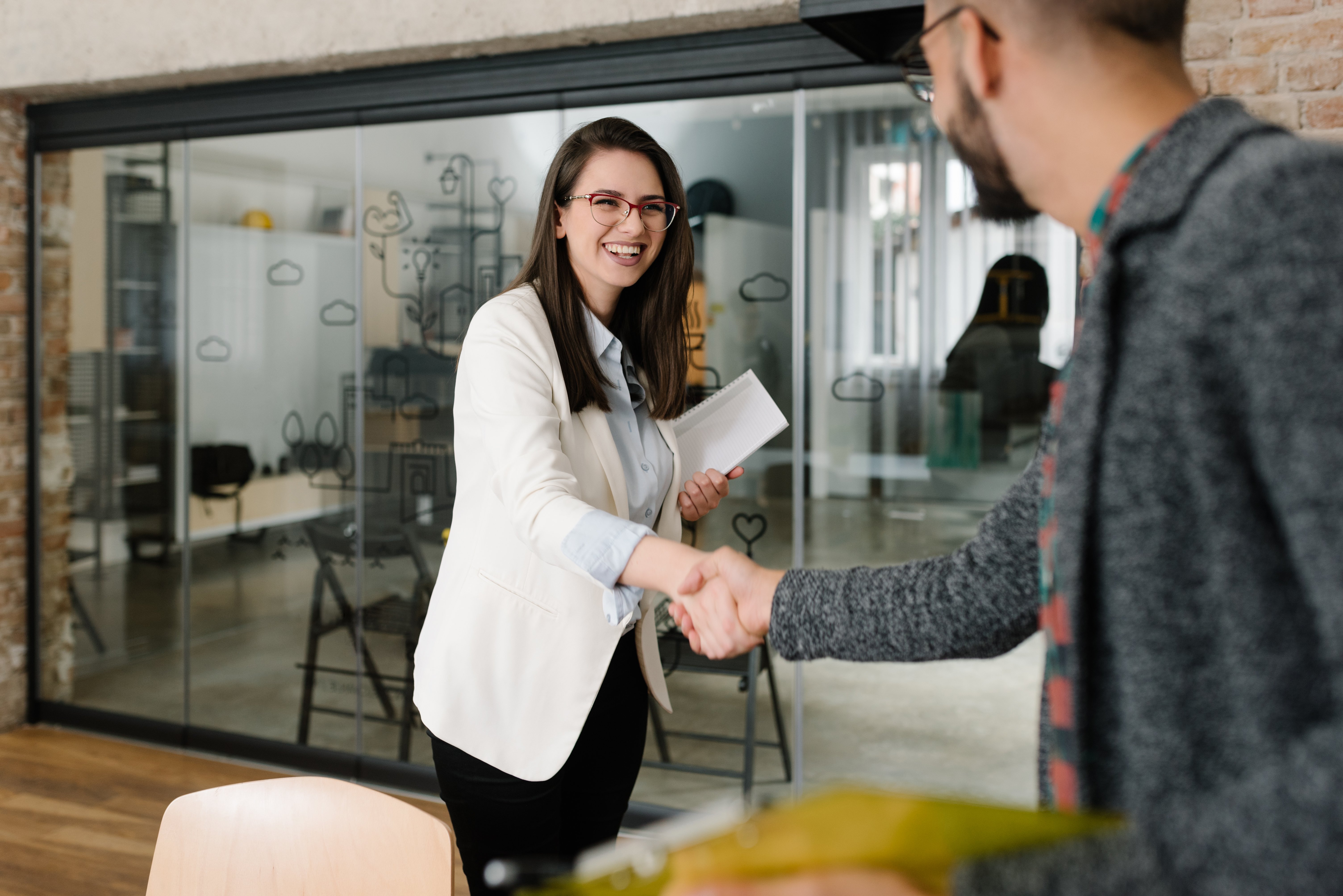 Recruiter shaking hands with contractor