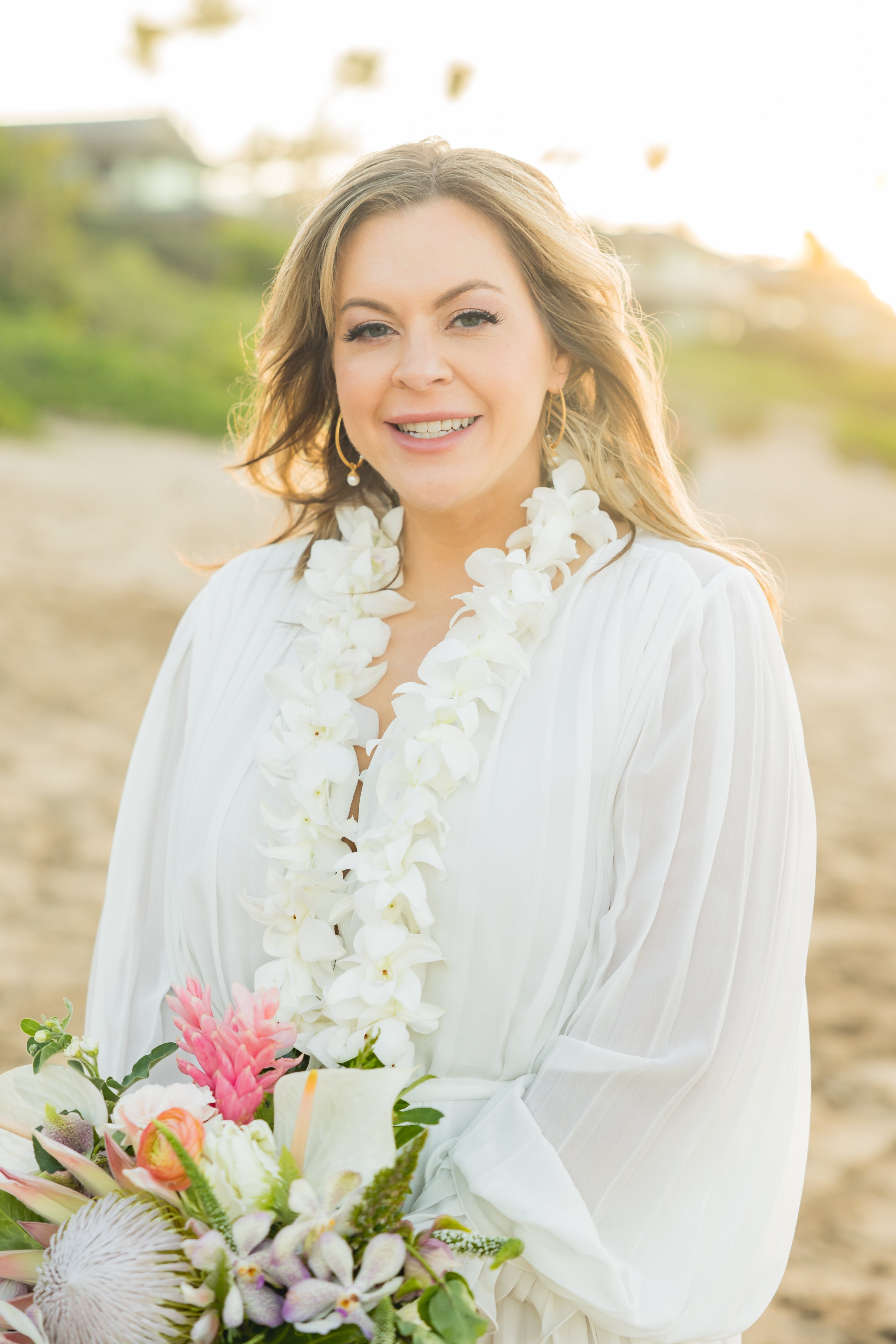 Wedding photo of Lauren Branch on beach in Hawaii