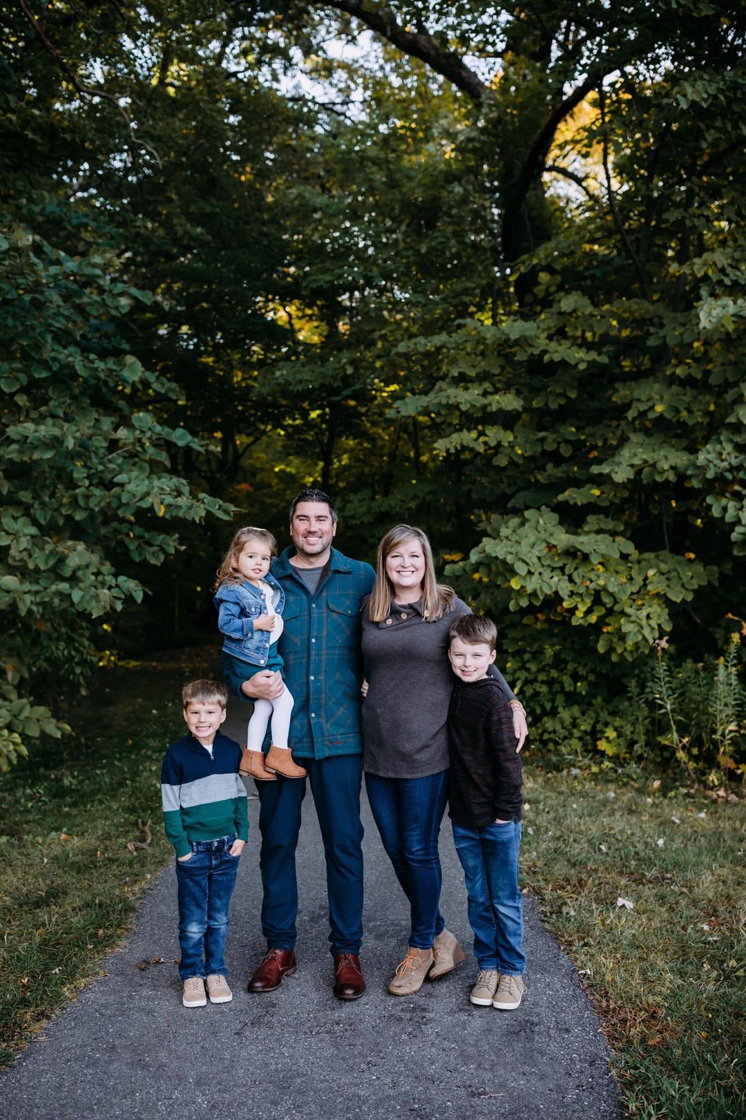 Nick Burns pictured with wife and children.