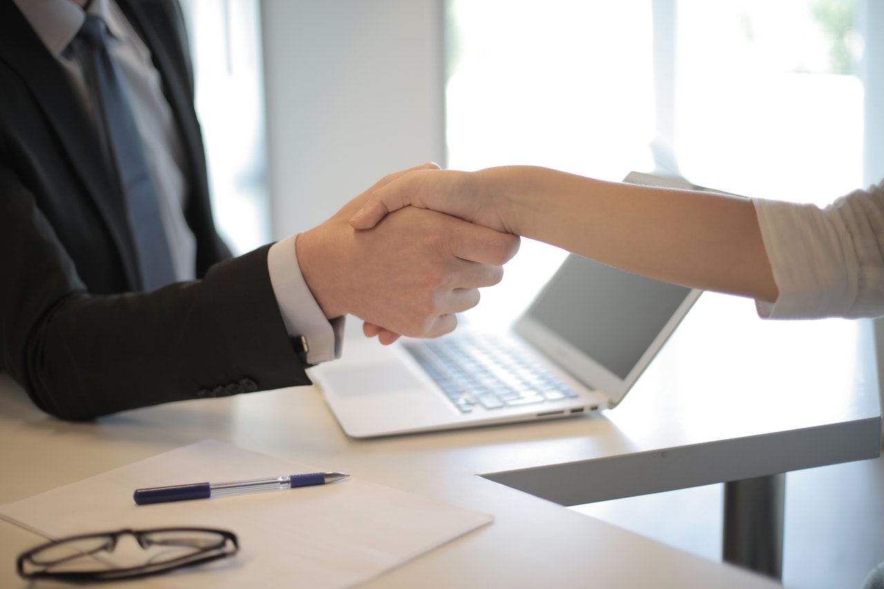 Man and woman handshake