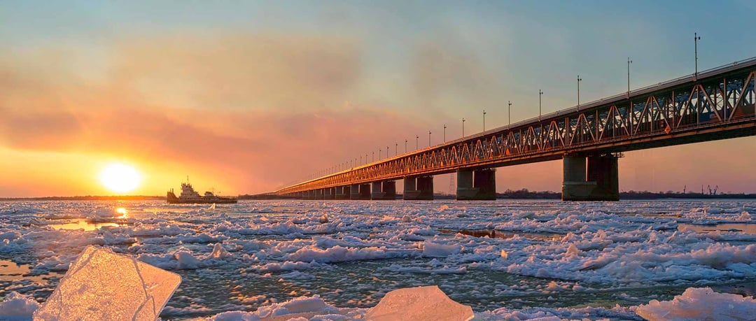 Ice drift on the Amur river. Amur bridge, Trans siberian railway. Khabarovsk, far East, Russia.