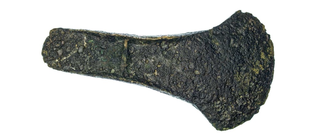 Ancient bronze age copper axe head