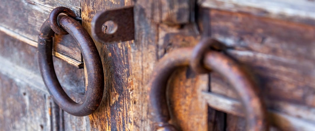 Antibacterial copper door handles on wooden door
