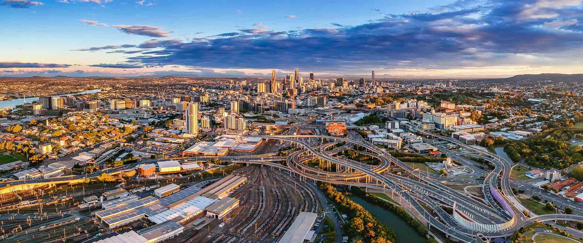 Brisbane city skyline with roads and train stations