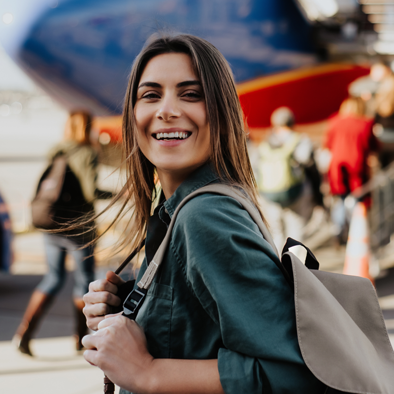 Woman boarding flight