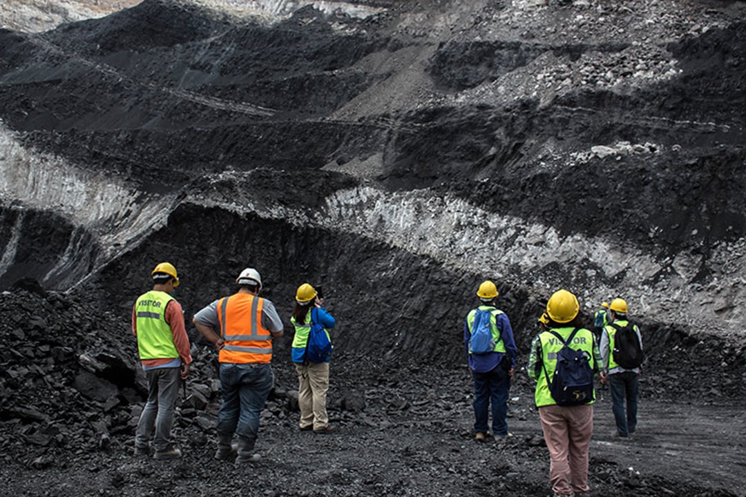 Geologist and engineer survey lignite coal mine