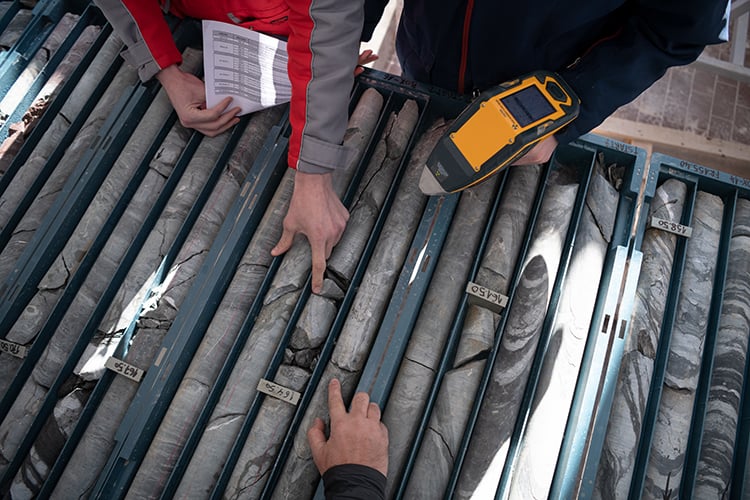 Geological core samples being measured