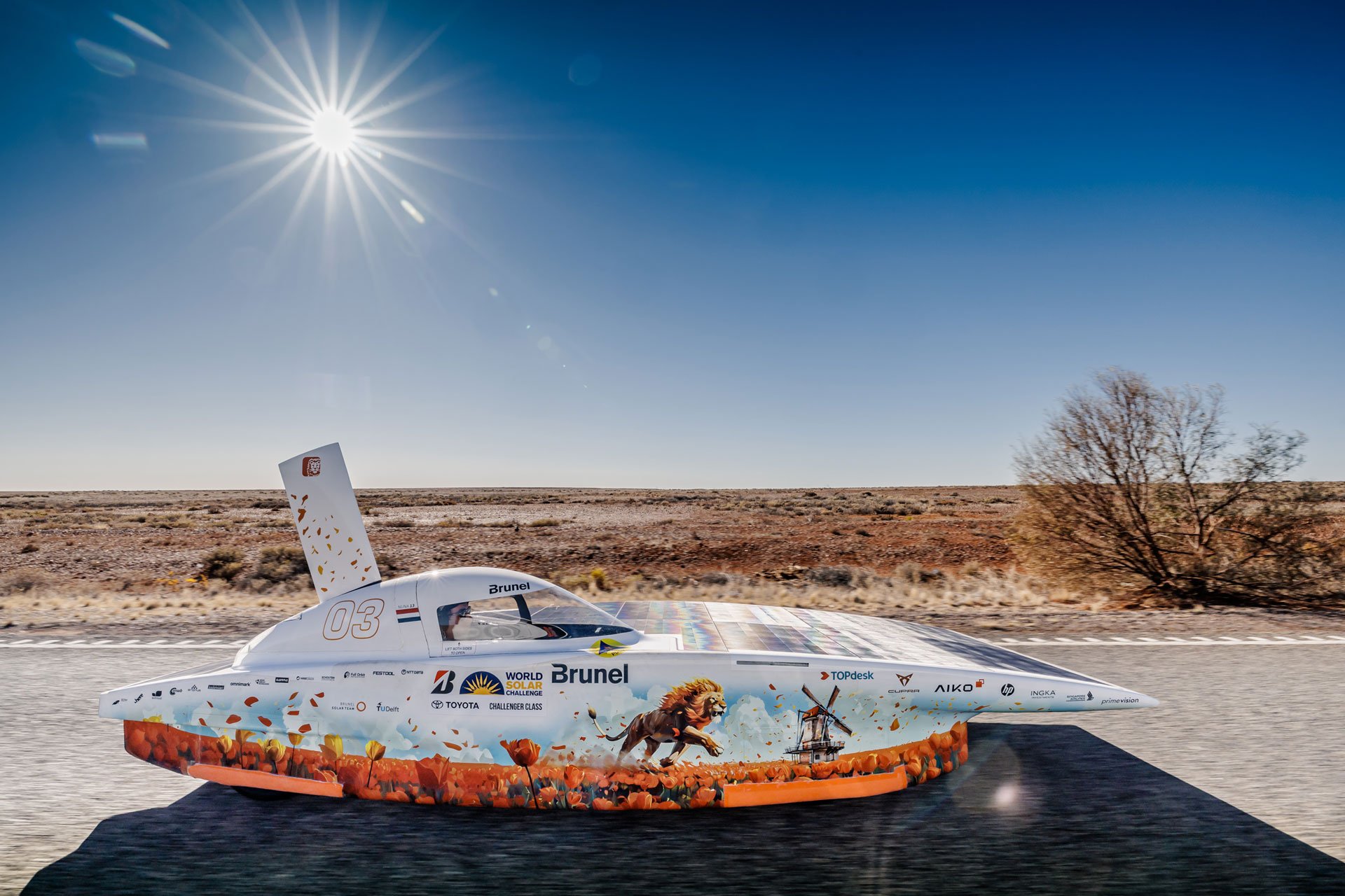 Nuna 13 solar car on an Australian highway