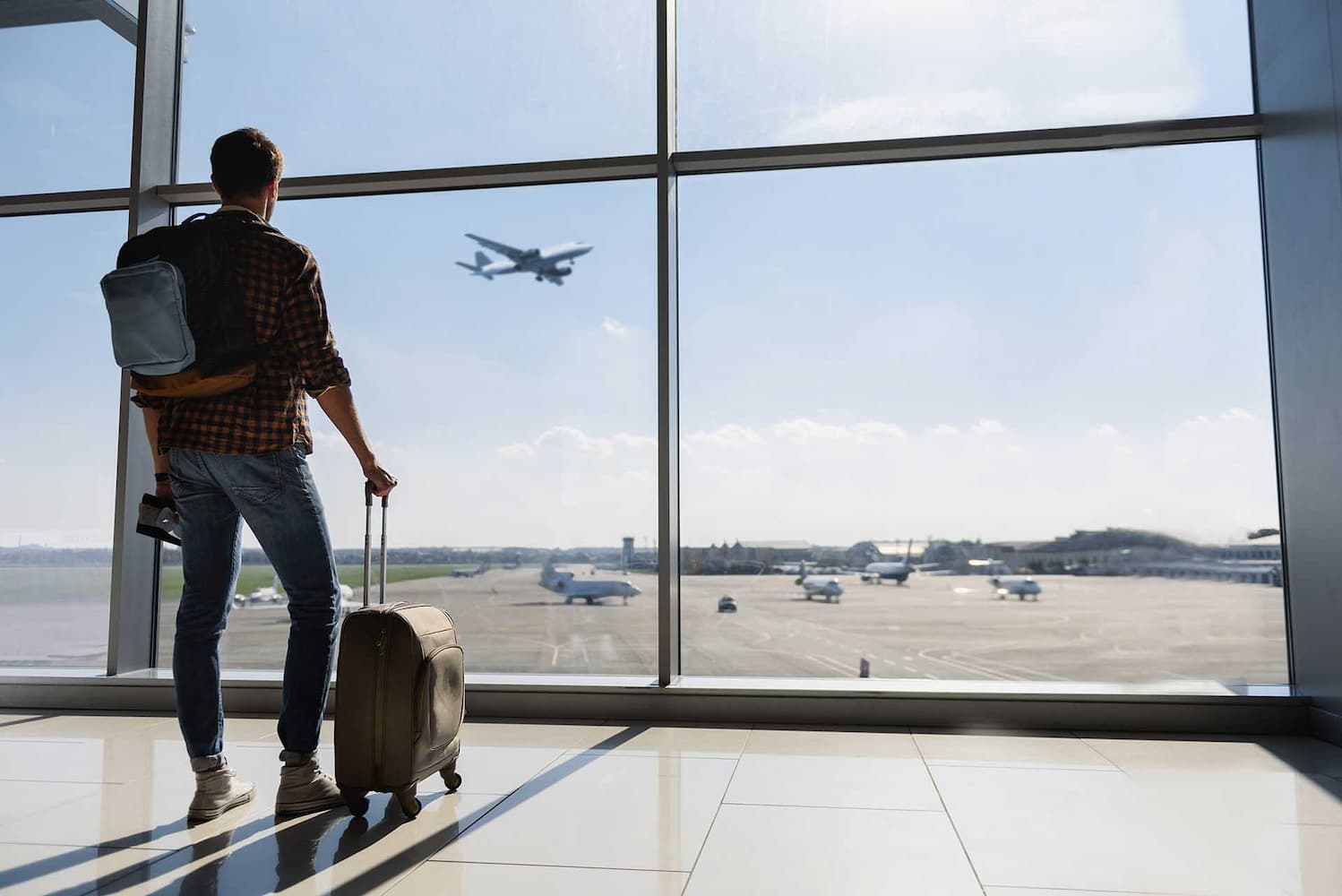 Man with suitcase at airport