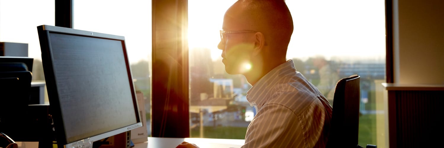 Man working on screen
