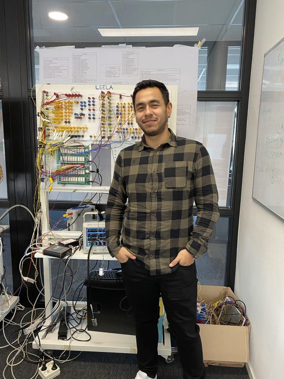 Man in front of a test bench in VDL factory