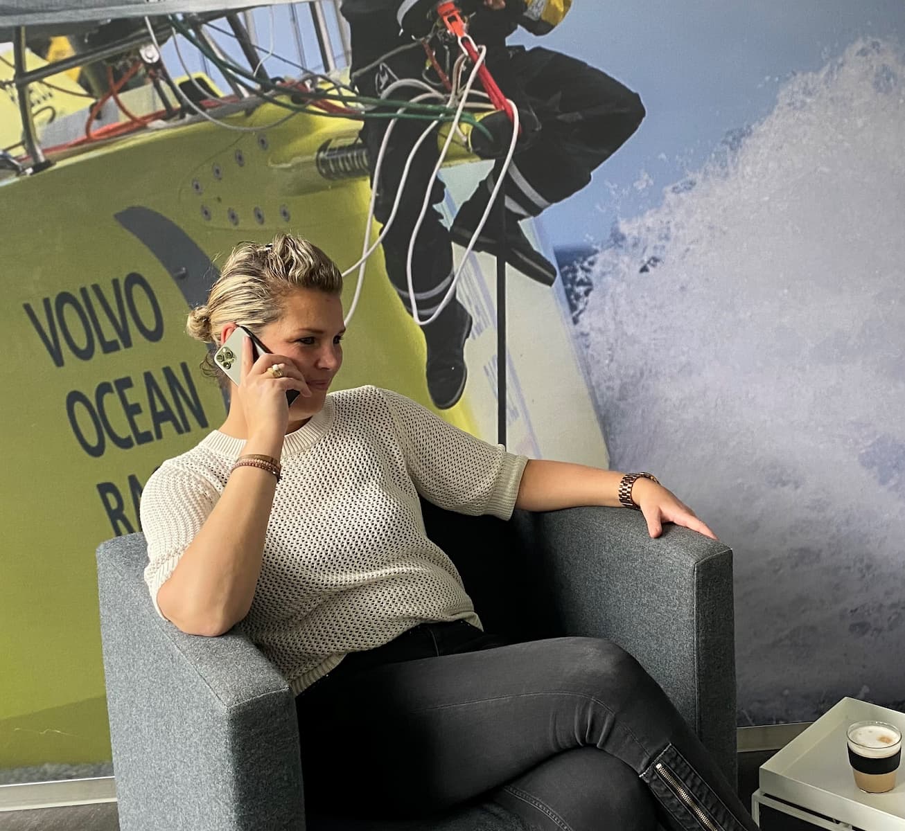 Woman in office drinking from sustainable keepcup