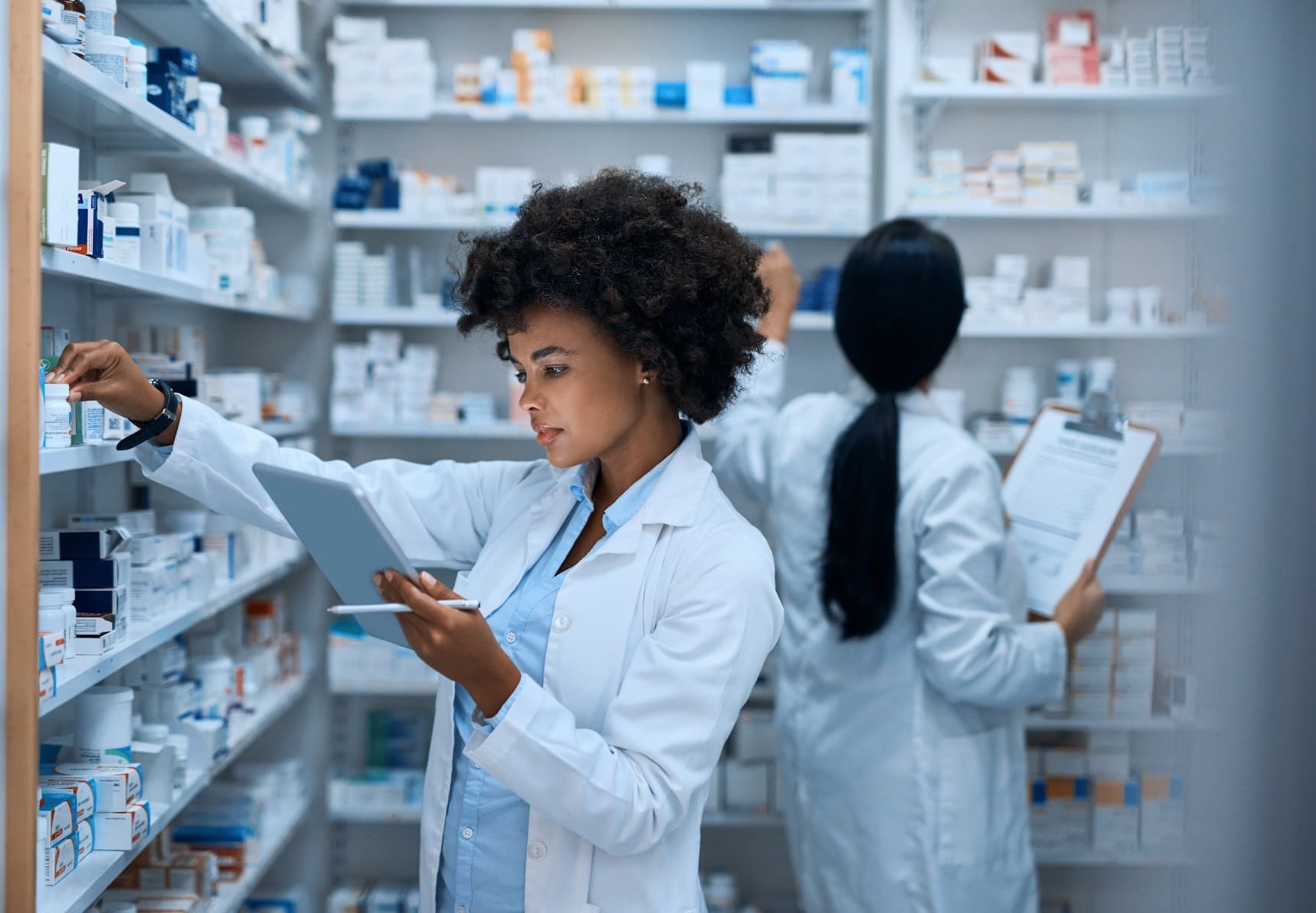 Pharmacist checking medicine