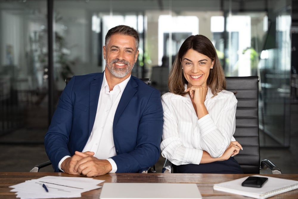 Two senior managers, one male and one female