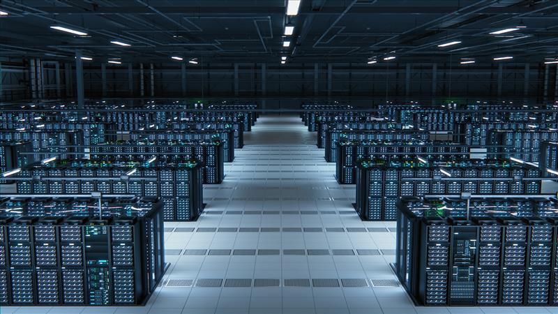 Large hyperscale data center floor with rows of server racks installed during data center construction.