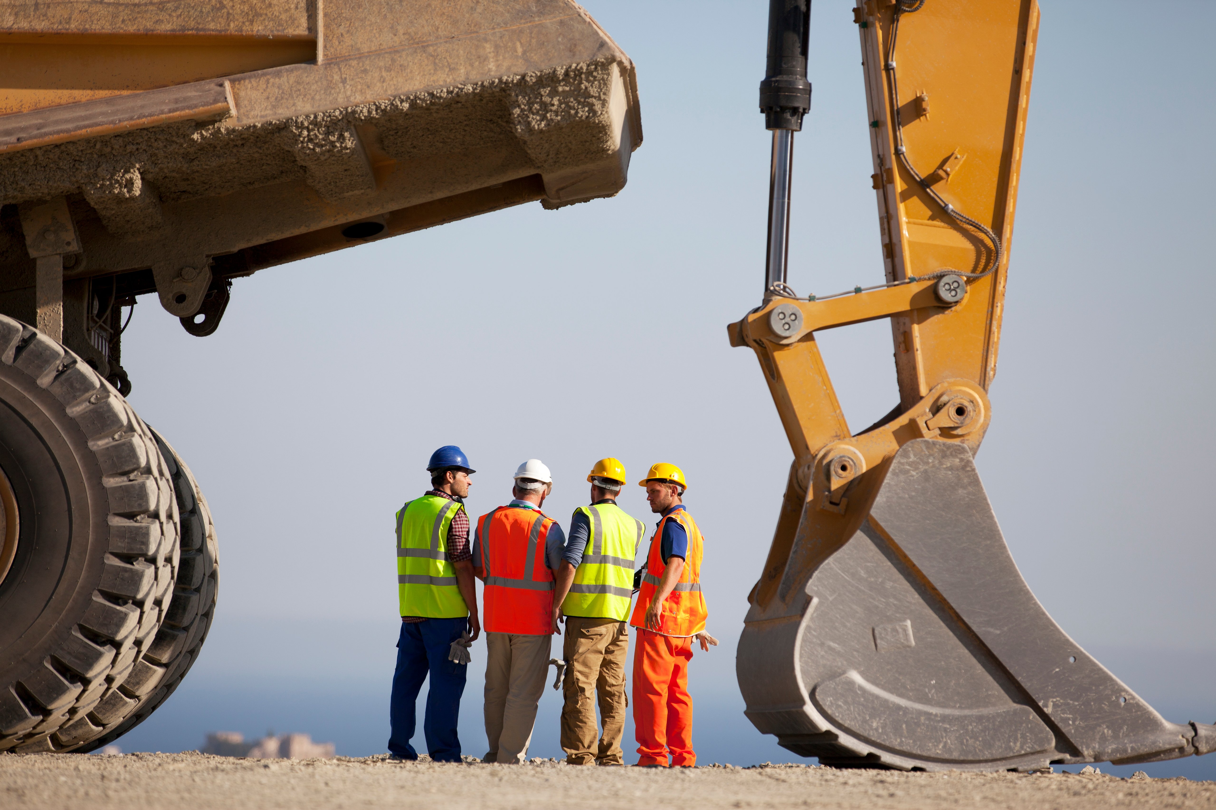 mining team evaluating equipment for surface vs subsurface mining decisions on site