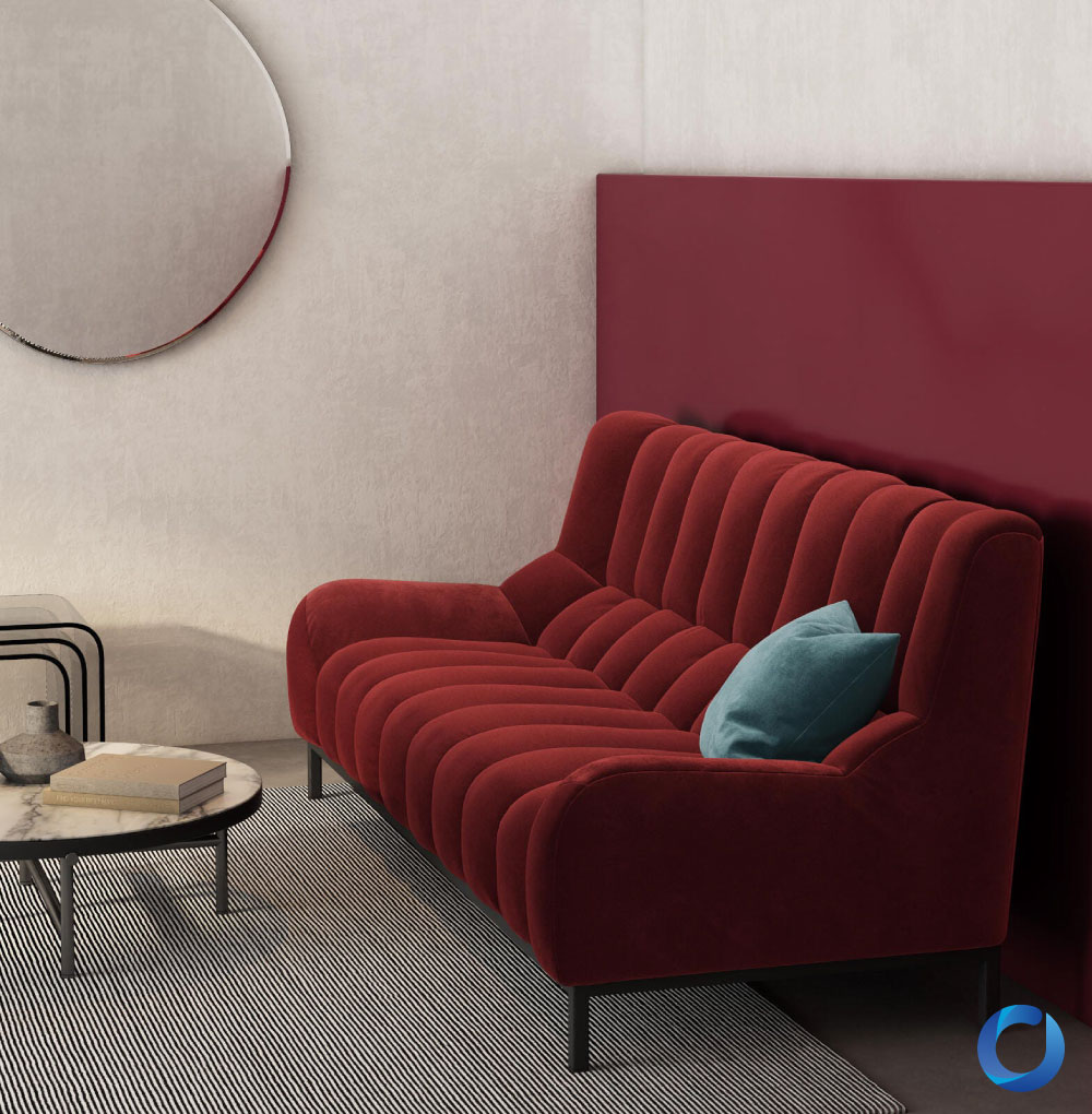 Luxurious red velvet sofa in modern living room setting. Moonraker Collection