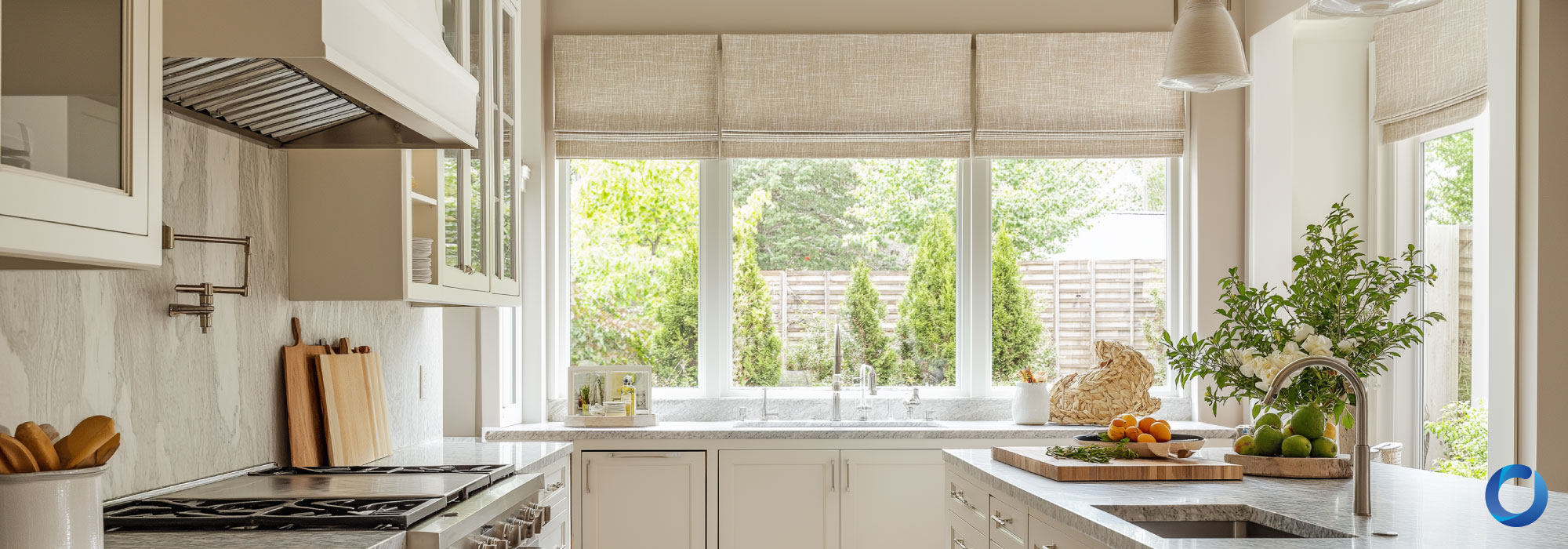 Bright modern kitchen with natural light and neutral roman shades.