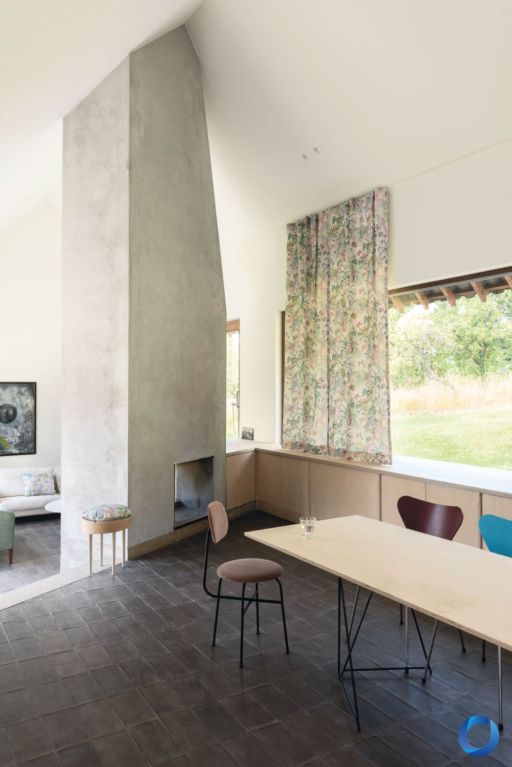 Modern dining space with floral curtains and minimalist decor. Tropico Collection