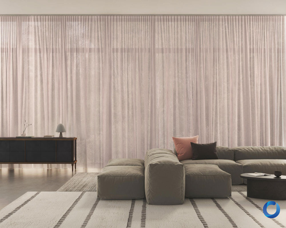Minimalist living room with floor-to-ceiling sheer curtains. Statement Collection