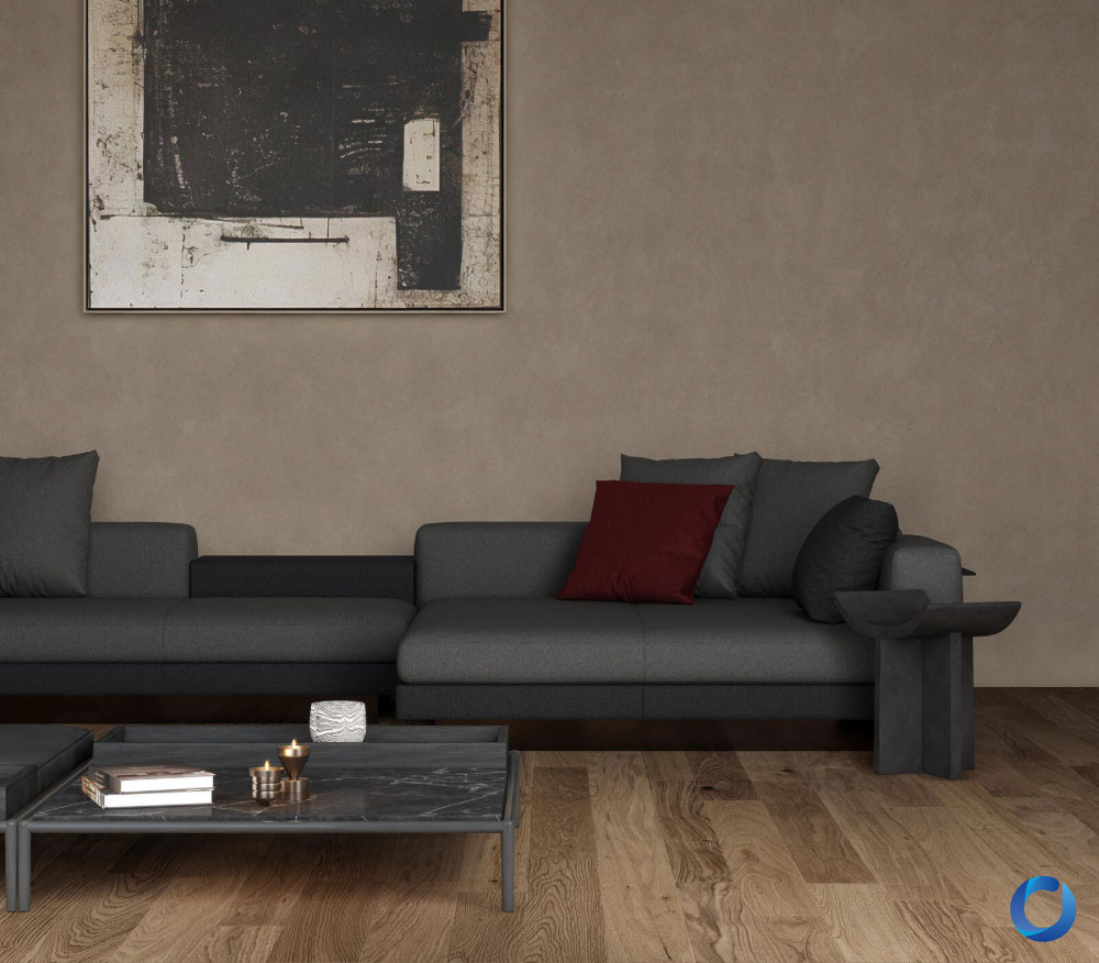 Minimalist living room with dark sofa and abstract artwork. Saboto Collection