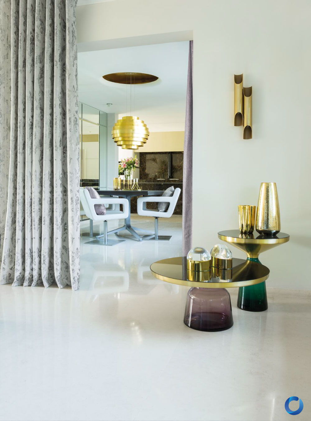 Luxury dining room with patterned curtains and gold decor accents. Collection Regent