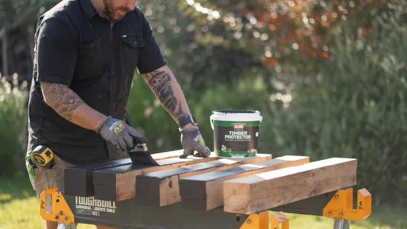 Painting the stumps with permanent waterproof paint