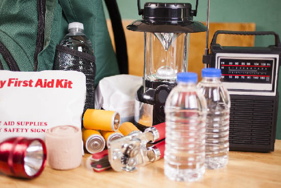 Emergency Supplies - First Aid Kit, Water Bottles, Batteries, Lamp Emergency Supplies - First Aid Kit, Water Bottles, Batteries, Lamp