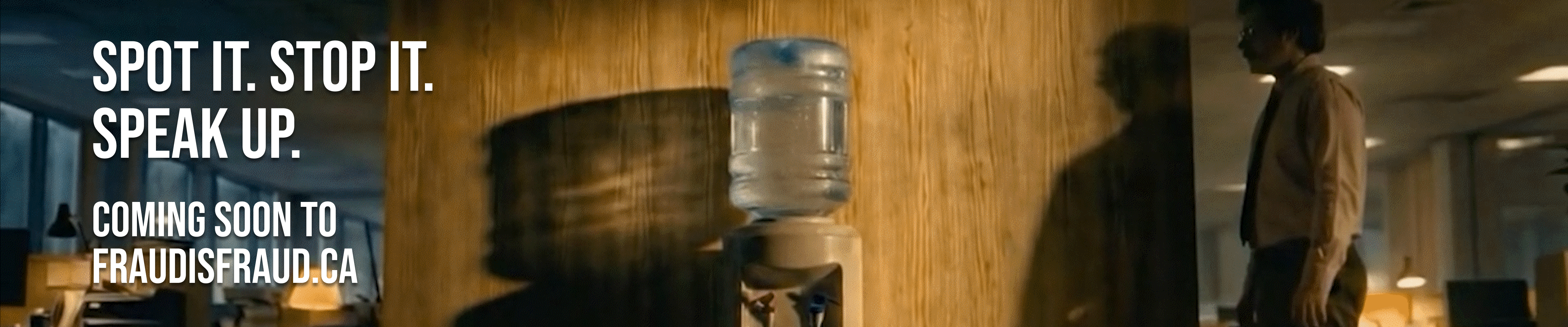 Man standing next to water cooler