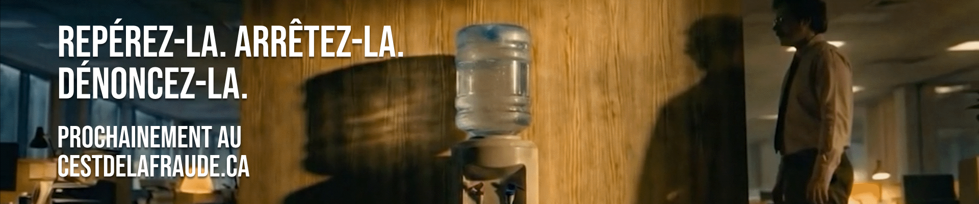 Man standing next to water cooler