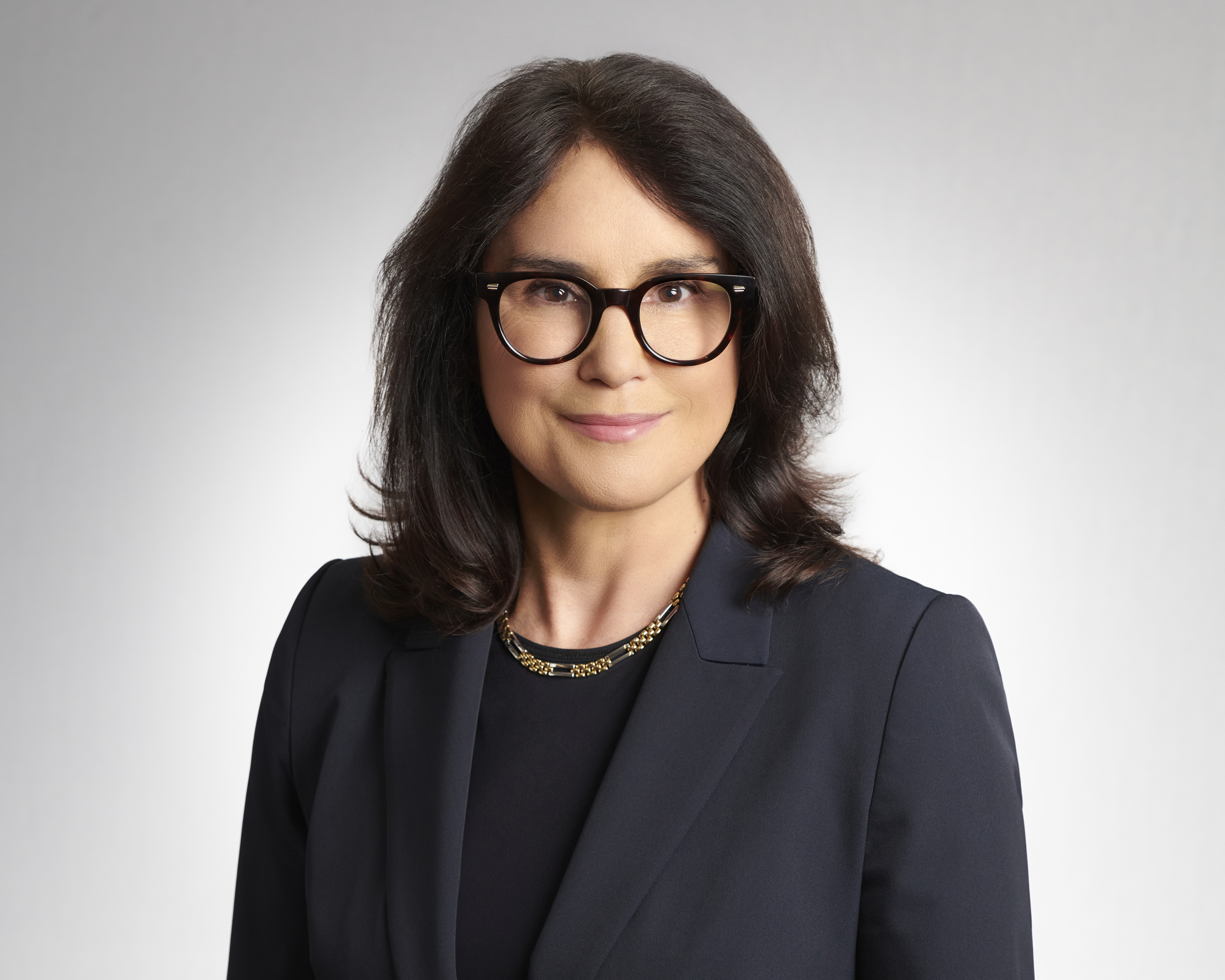 Professional headshot of Lyne Duhaime with a calm expression