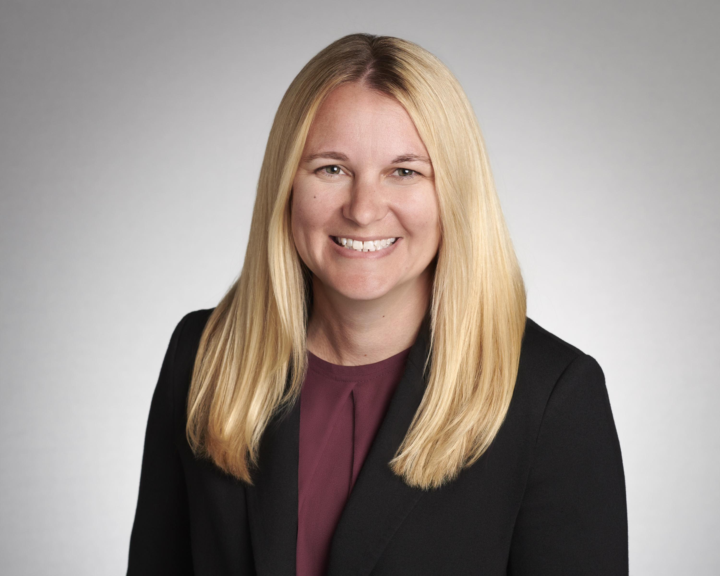 Headshot of Sarah Hobbs with a confident, professional expression