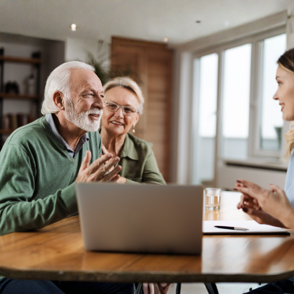 happy retirees seeking financial advice