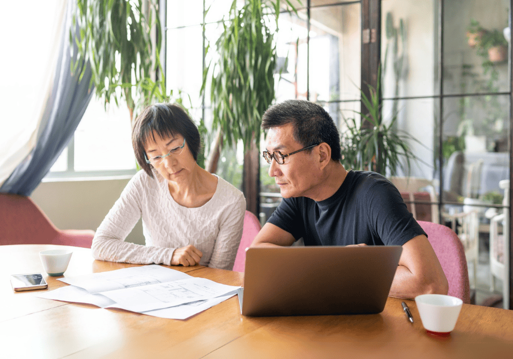 retirees looking at the laptop